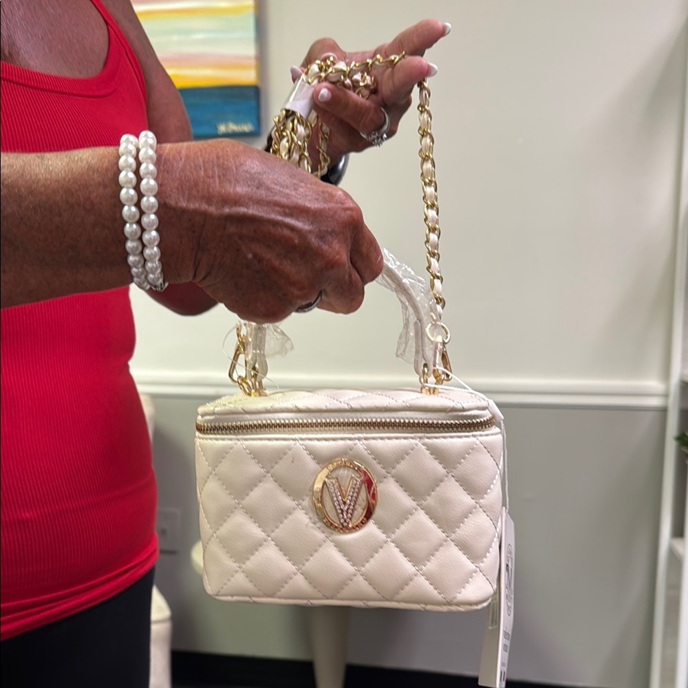 Valentino Orlandi Cream and Gold Mini Bag with Quilted Design

$99.00 TODAY ONLY